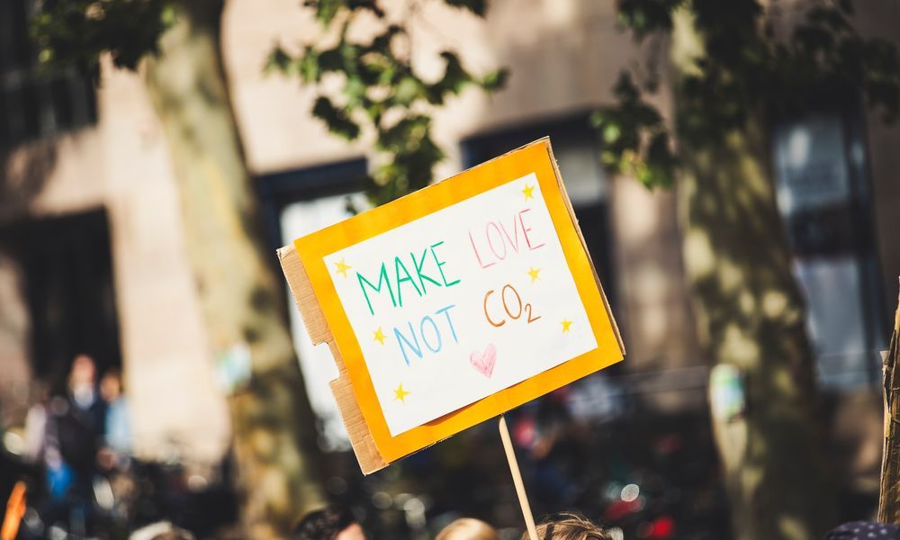 a stormtrooper picking up a flower